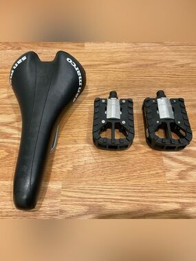Black Bike Saddle with Black Pedals